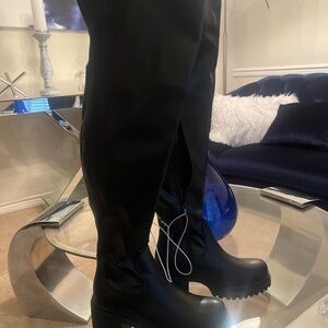 Women’s thigh high combat boots